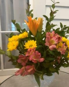 Flowers in a bouquet in colors of pink, orange and yellow