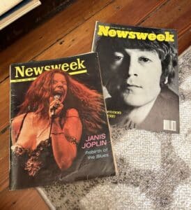 Two Newsweek magazines with people on the cover.
