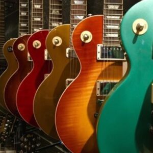 Close up guitar images in different colors.